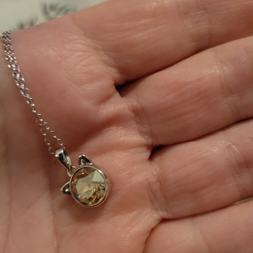 Sterling silver and pale yellow topaz kitty head necklace